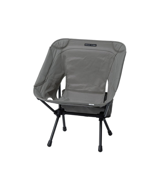 Snow Peak × Helinox lightweight folding camping chair with black aluminum frame and greige seat