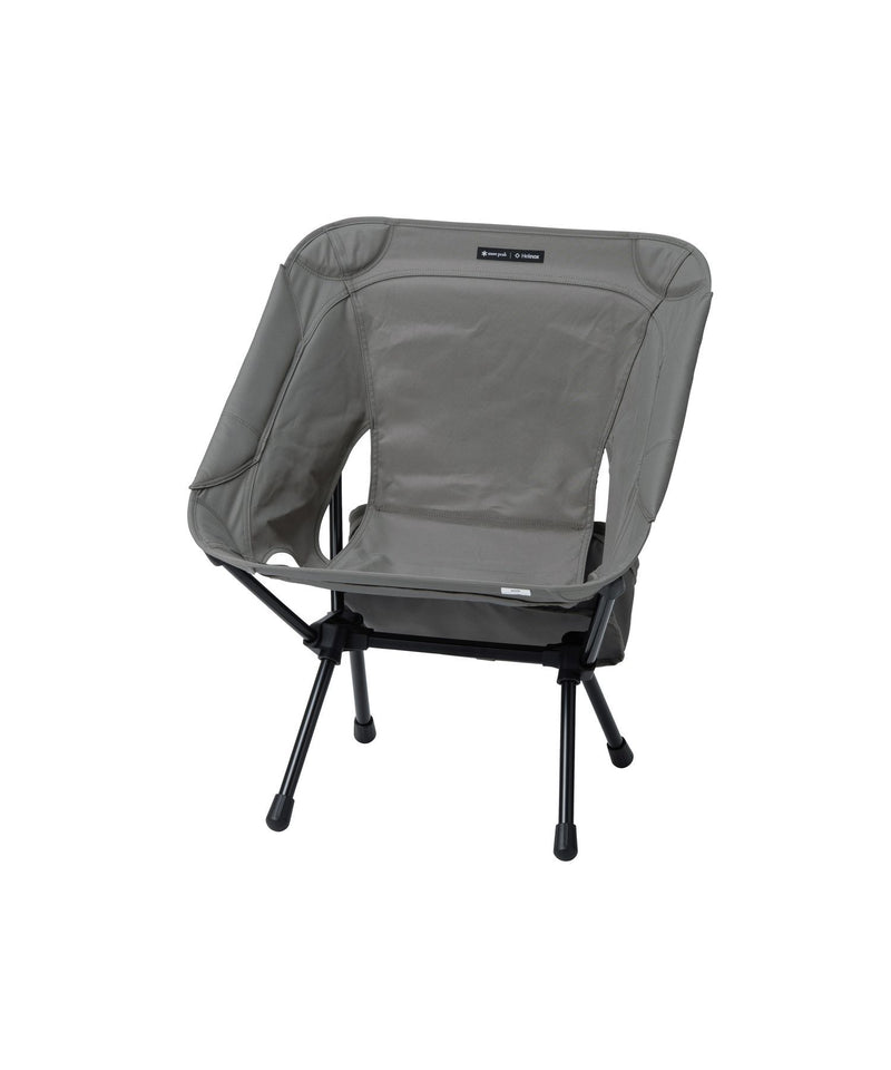 Snow Peak × Helinox lightweight folding camping chair with black aluminum frame and greige seat