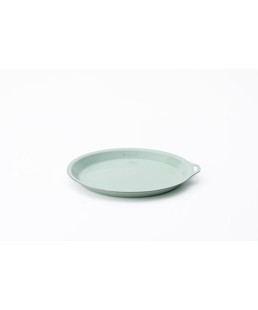 Light green ceramic dish on a white background