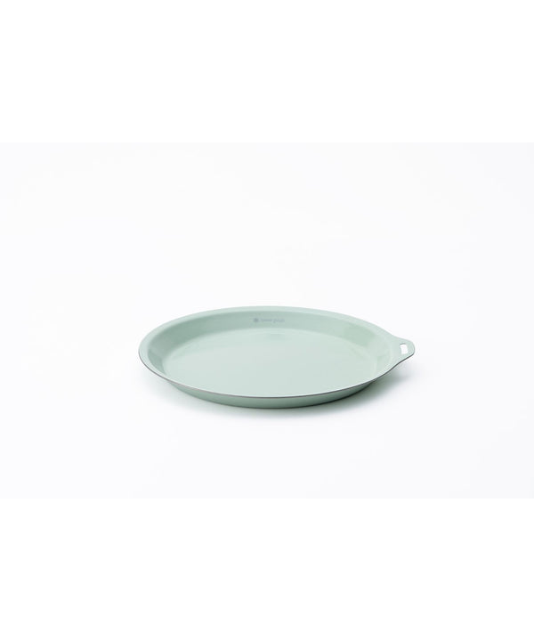 Light green ceramic dish on a white background