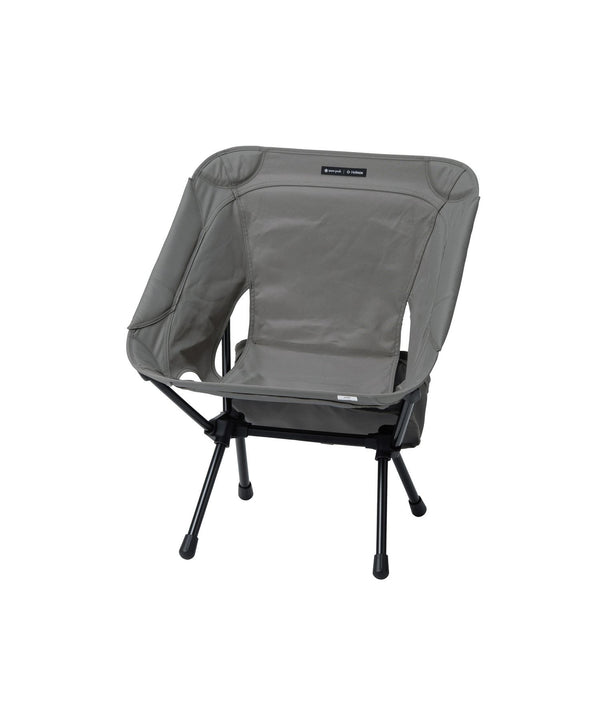 Snow Peak × Helinox lightweight folding camping chair with black aluminum frame and greige seat